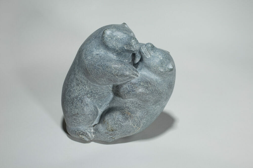 Bears Wrestling. Artist: Mathew Aqigaaq. Medium: granite.