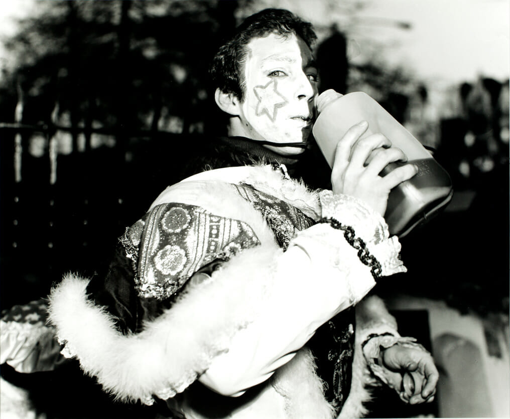 Mummer’s Parade. Artist: John R. Coplans. Date: 1982. Medium: gelatin silver print.