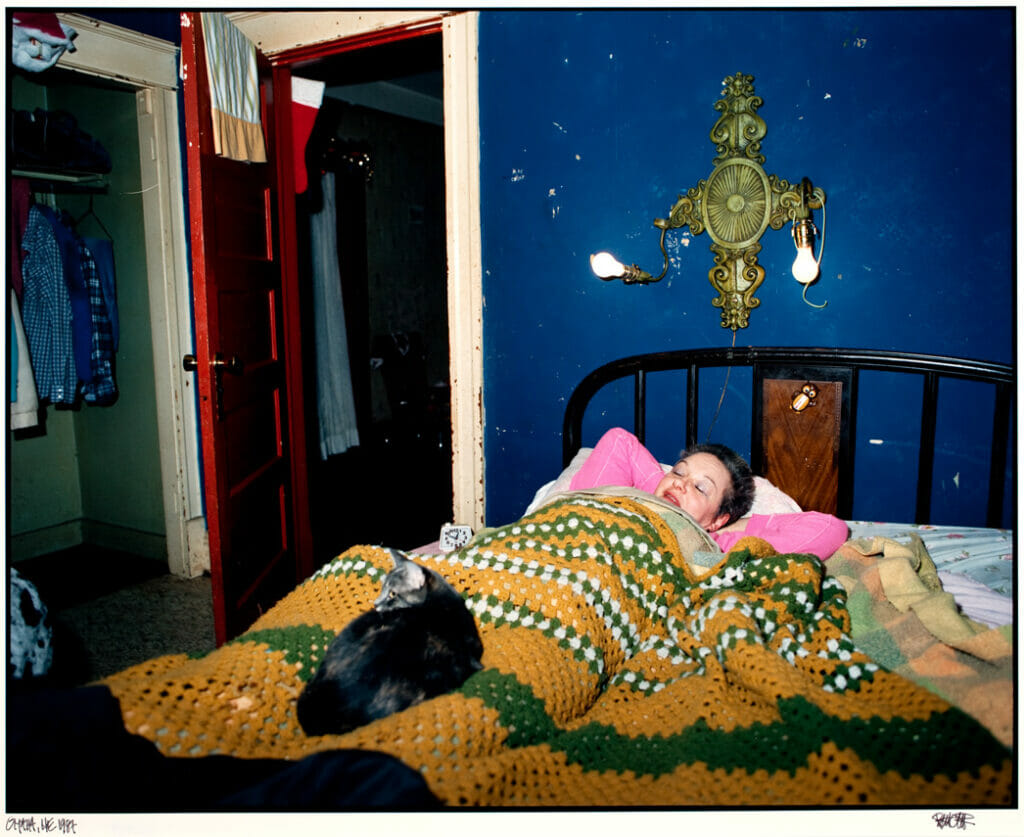 Mom (Bed), Omaha, Nebraska. Artist: Rita Cihlar Hermann. Date: 1987. Medium: dye-coupler print.