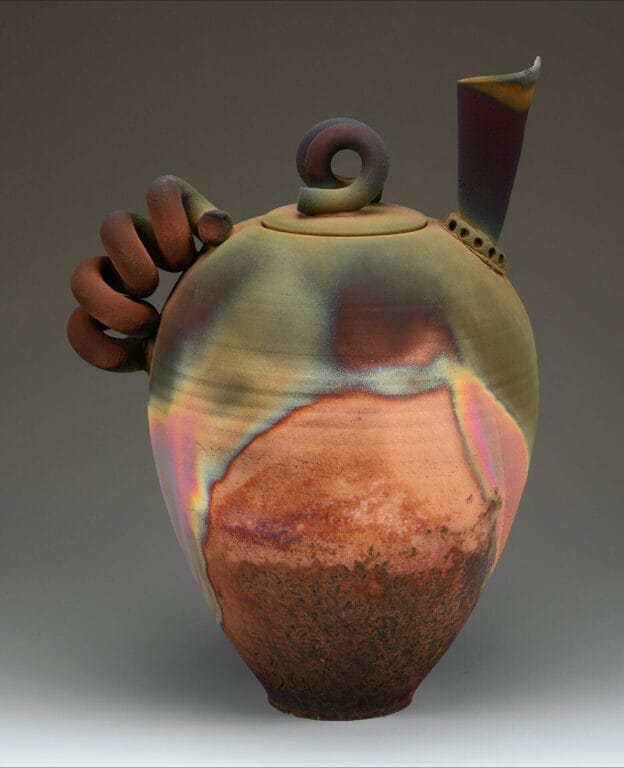 ceramic vase with abstract, coil shapes for the handles
