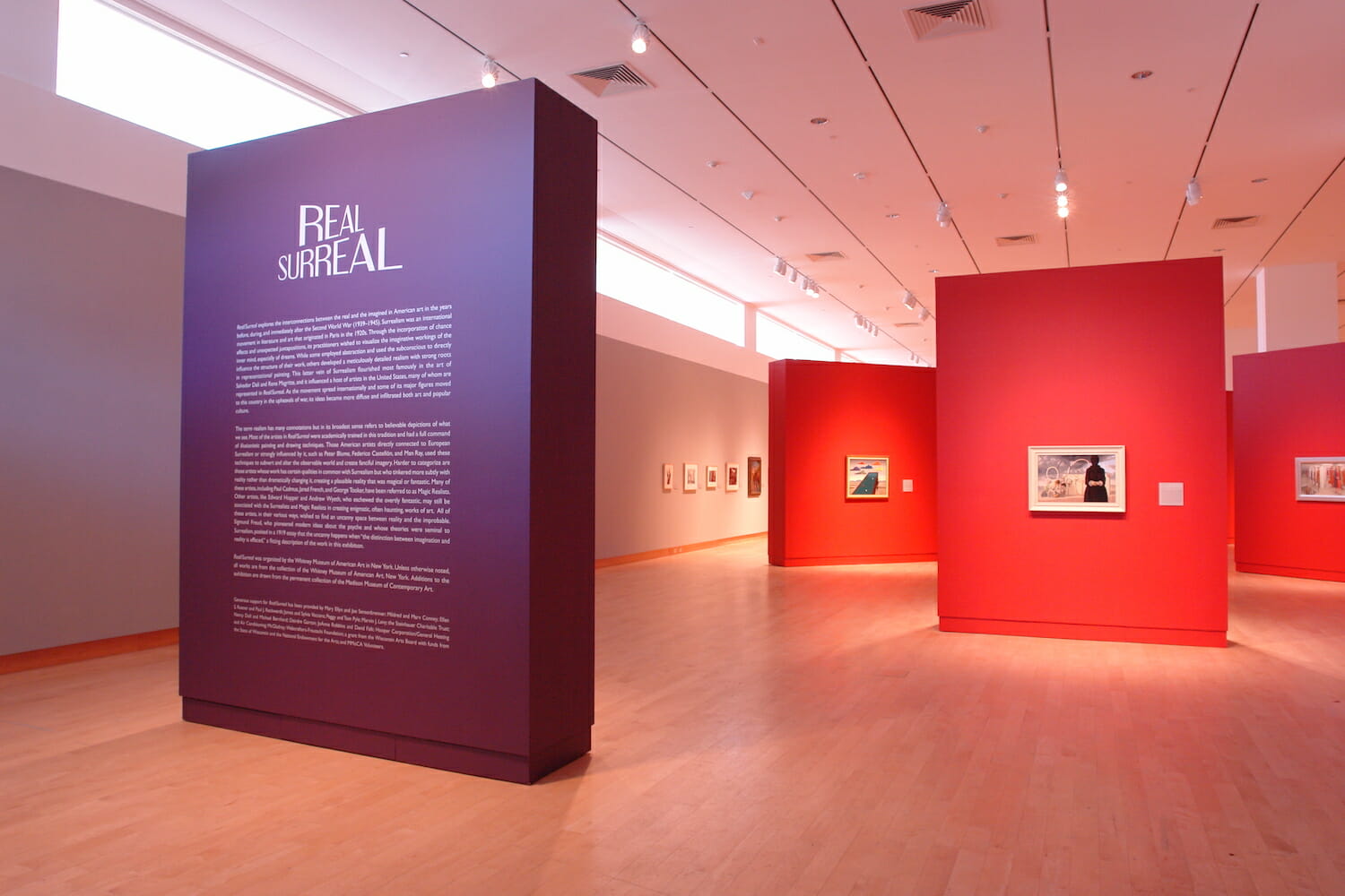installation view of an exhibition with an arrangement of walls