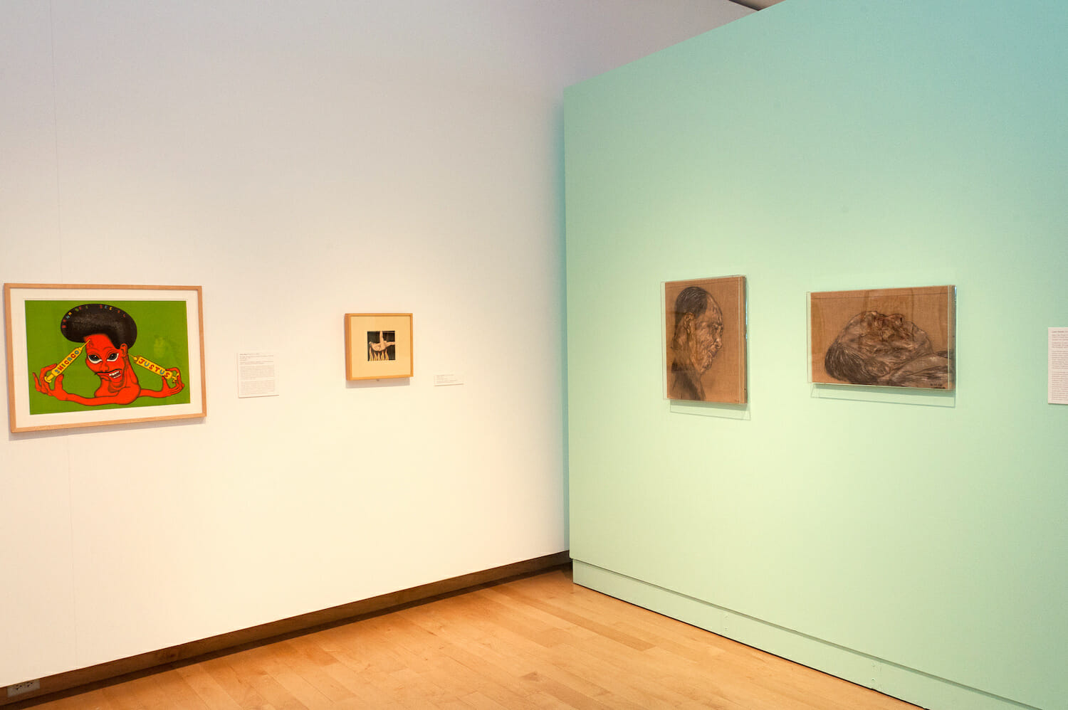 installation view of the exhibition Chicago School featuring artworks hanging vertically across walls