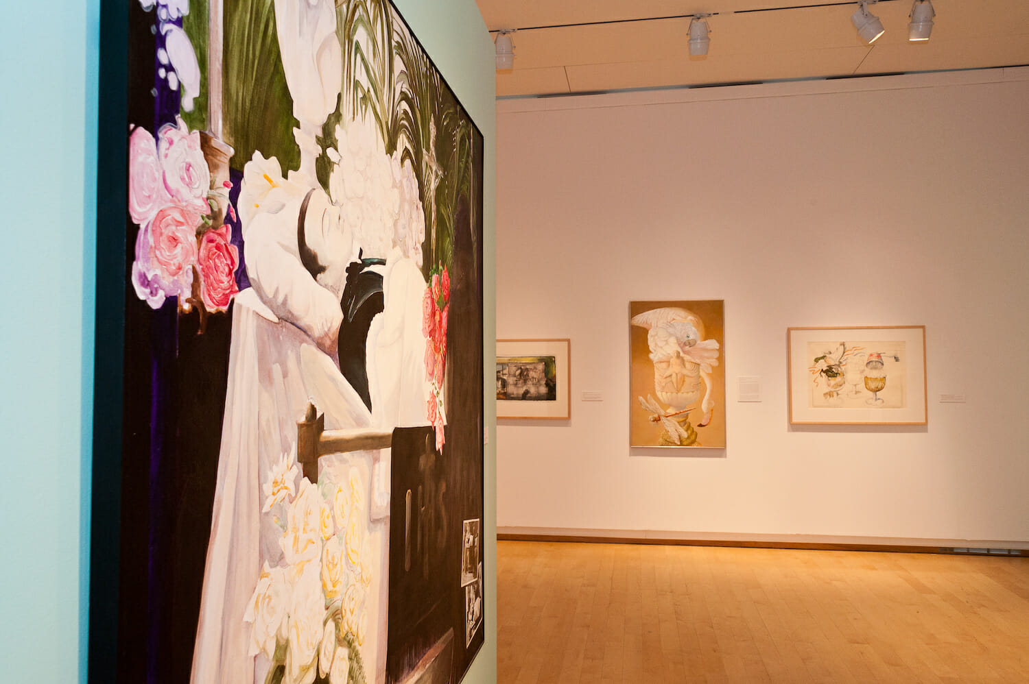 installation view of the exhibition Chicago School featuring artworks hanging vertically across walls