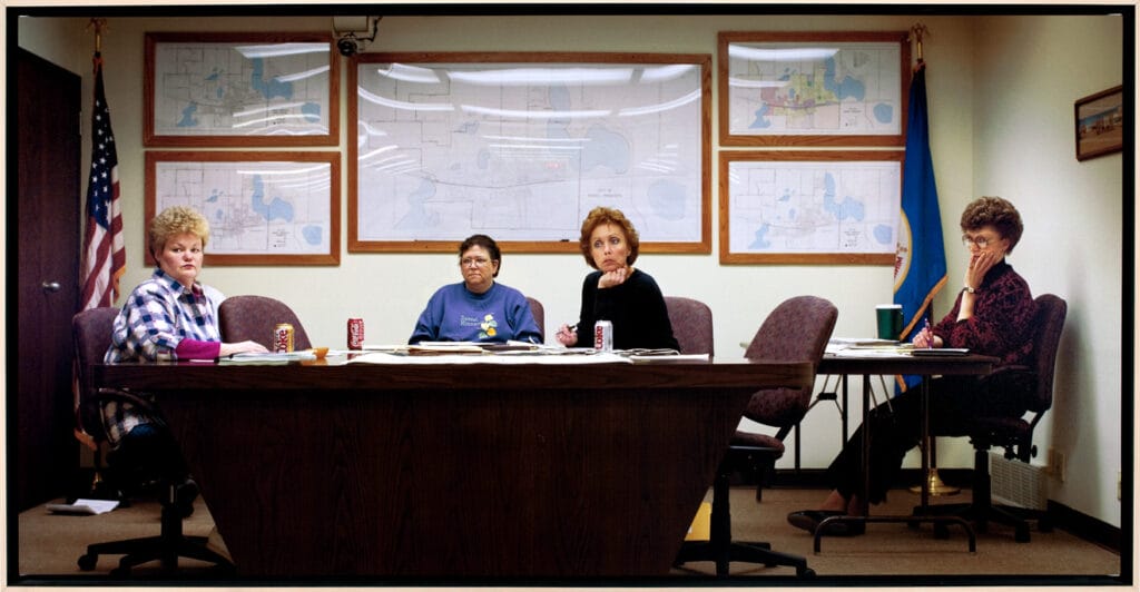 Dassel City Council, Dassel, Minnesota (population 1,134), City Council, March 15, 1999 (L to R):  Nancy Nicholson, Ava Flachmeyer (Mayor), Jan Casey, Sherlyn Bjork (Deputy Clerk). Artist: Paul Shambroom. Date: 1999. Medium: archival pigmented inkjet on canvas with varnish.