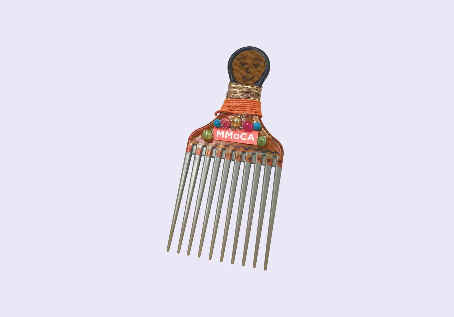 Hair tool decorated with beads, glitter, and string inspired by the artist and trained barber Faisal Abdu'Allah
