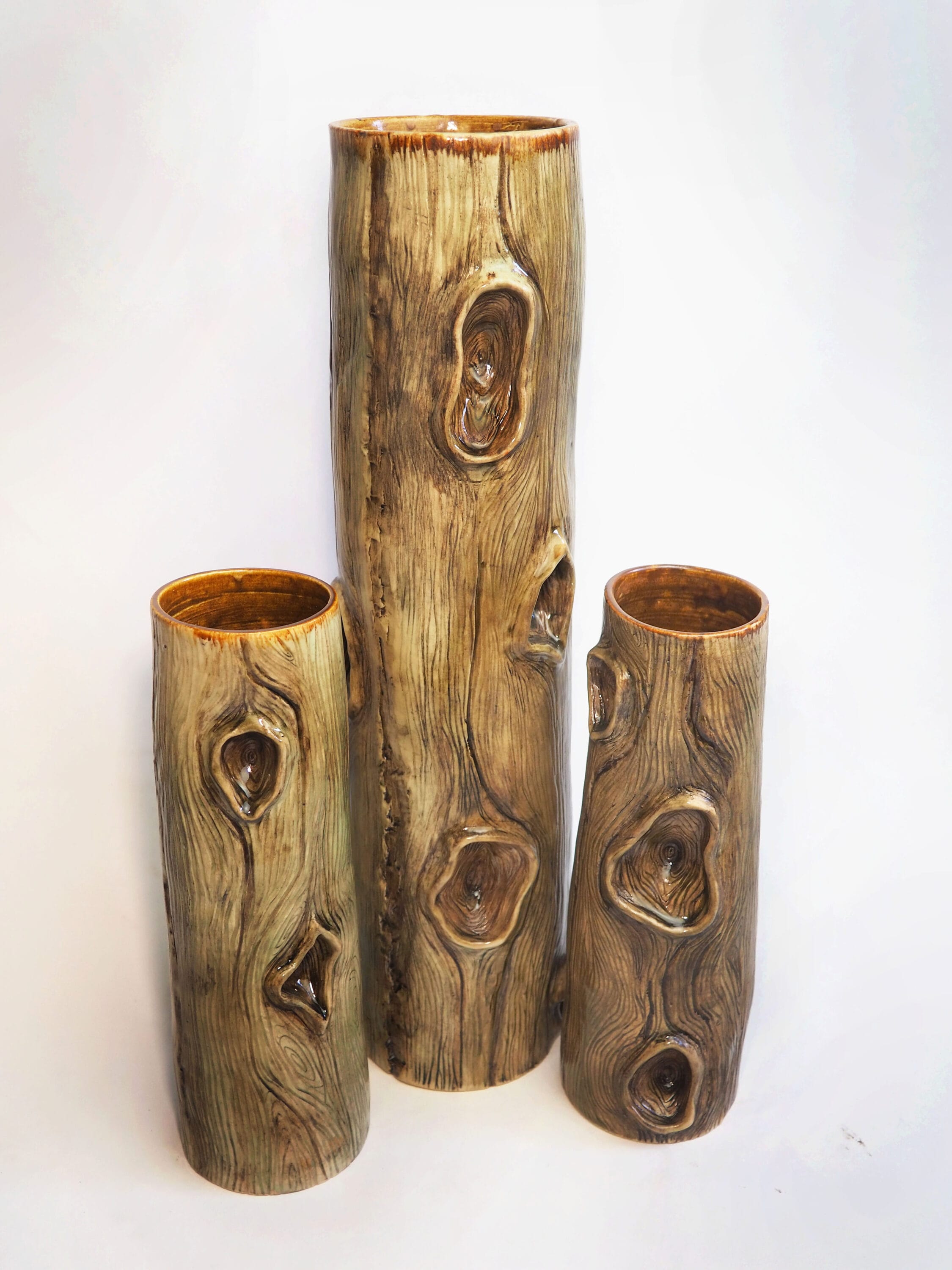 ceramic vessels that look like wood.
