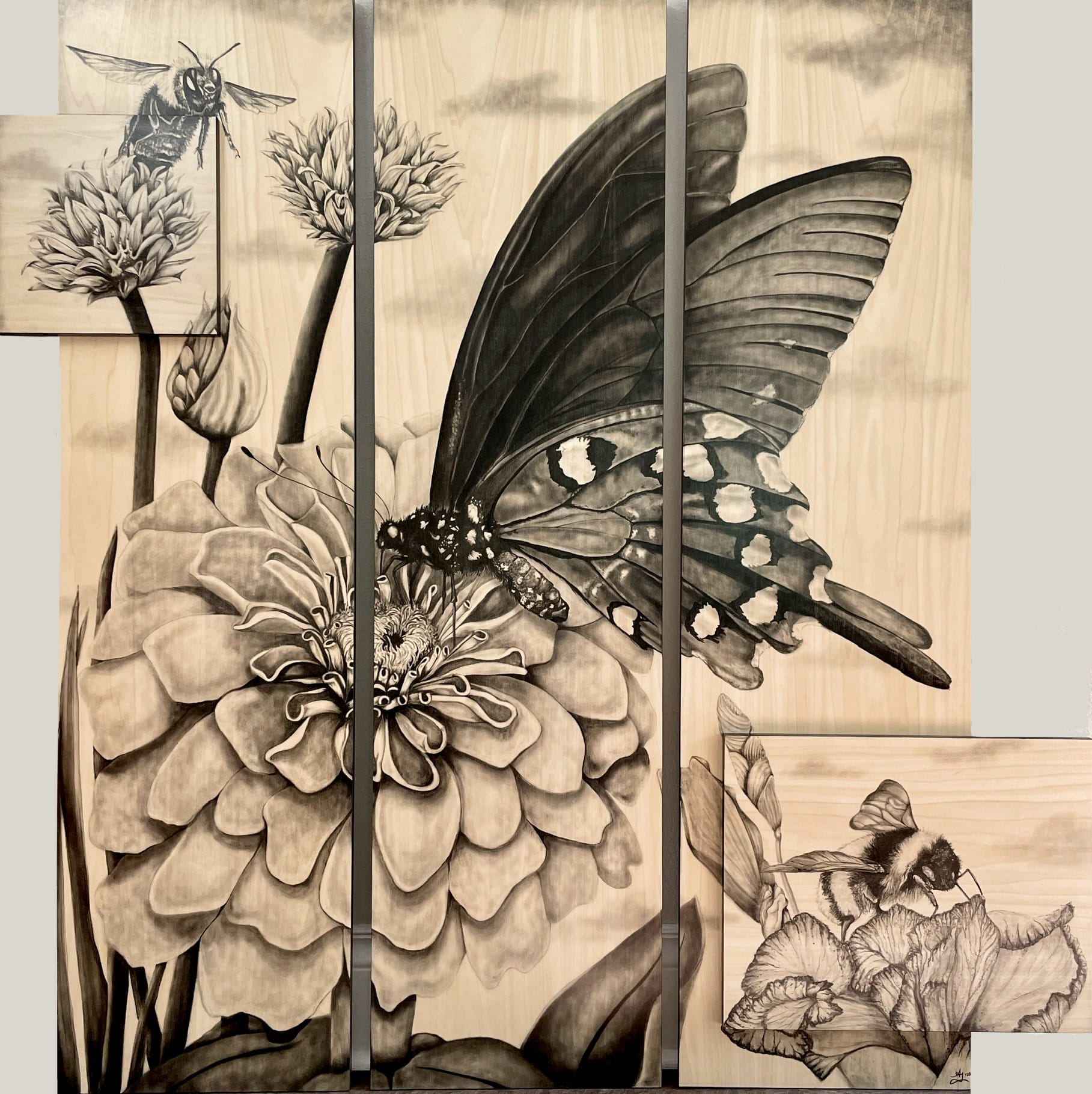 woodstain art of a moth on a flower.