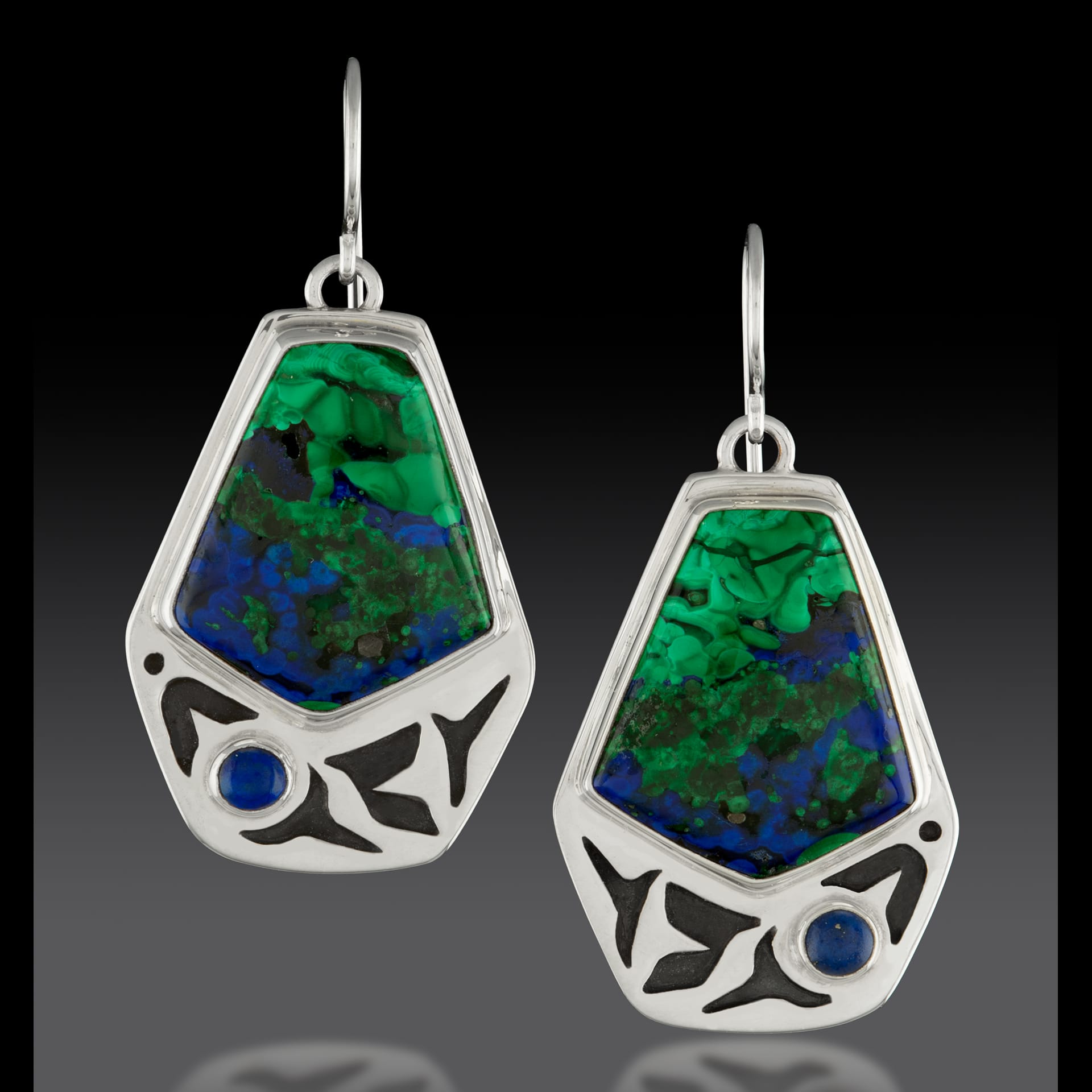 silver earrings with blue green stones.
