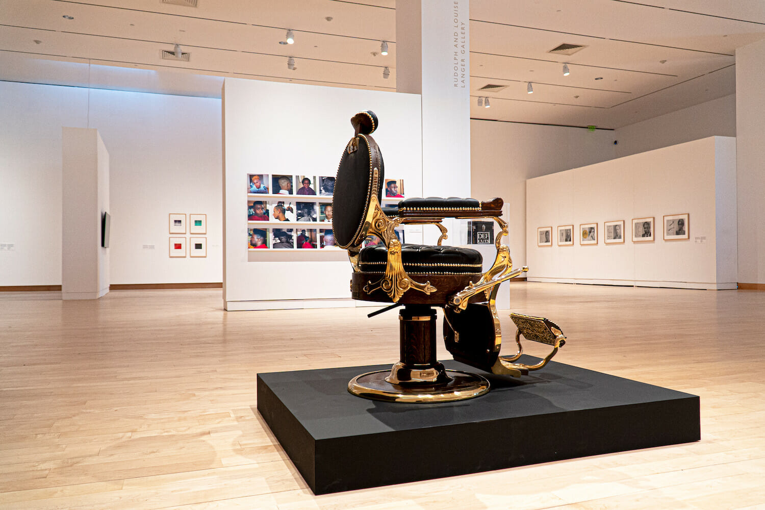 Installation view of Faisal Abdu'Allah: Dark Matter, featuring a barber's chair on display in the Main Galleries.