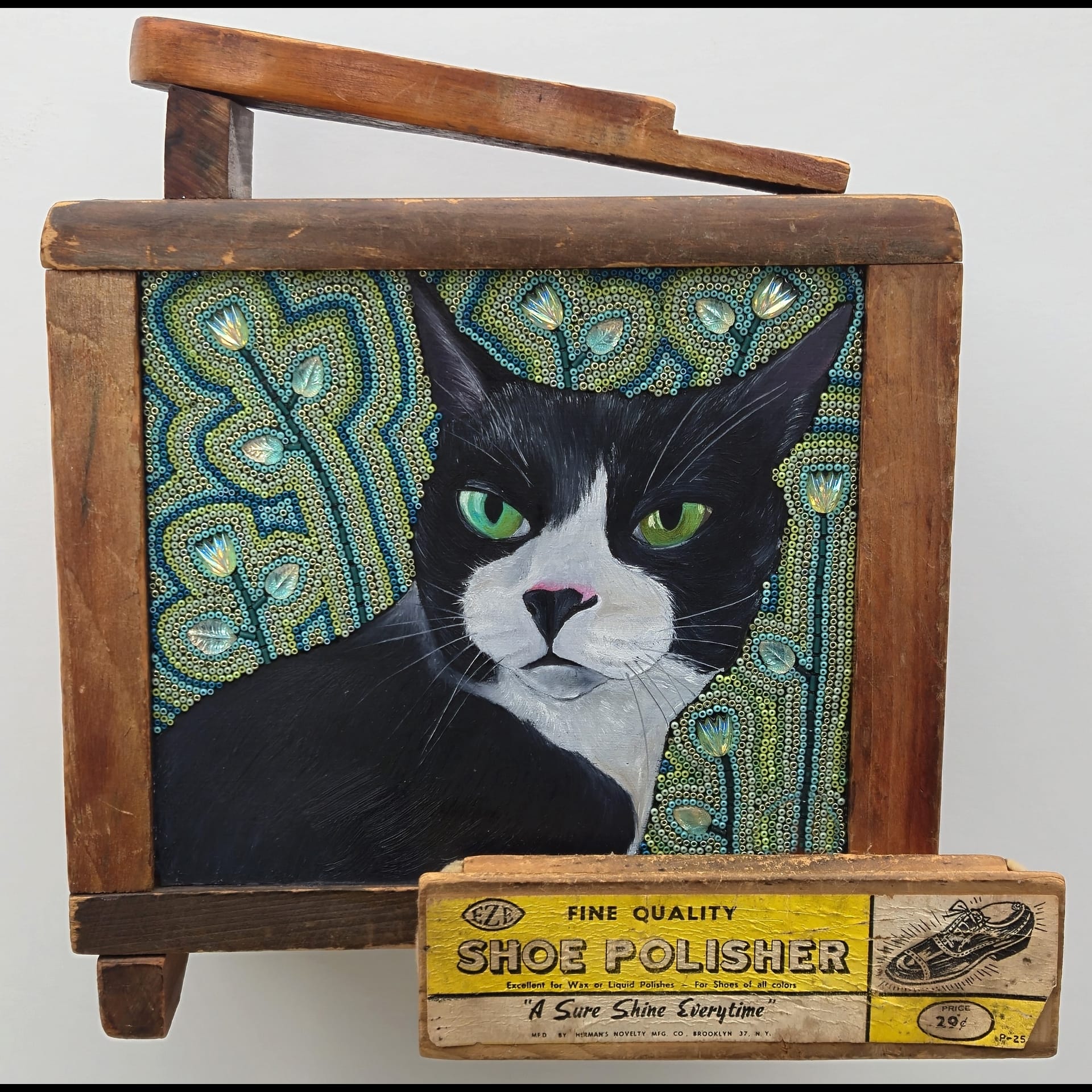 A cat against a green background on a found object.