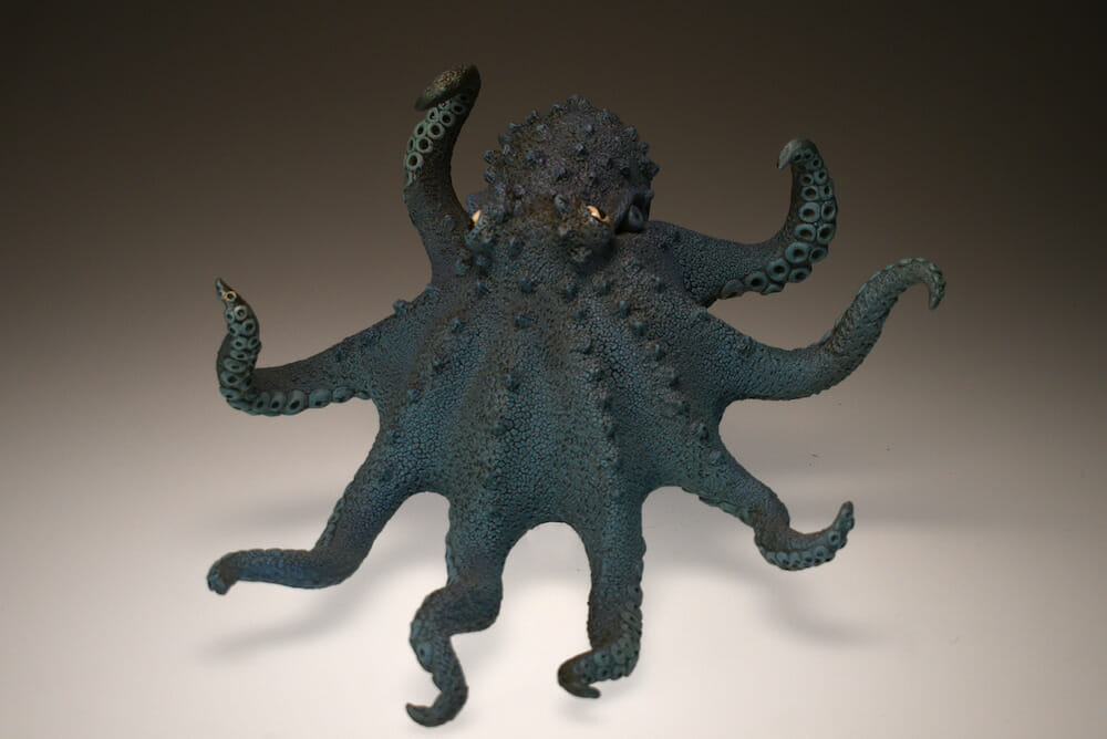 Ceramic sculpture of an octopus.