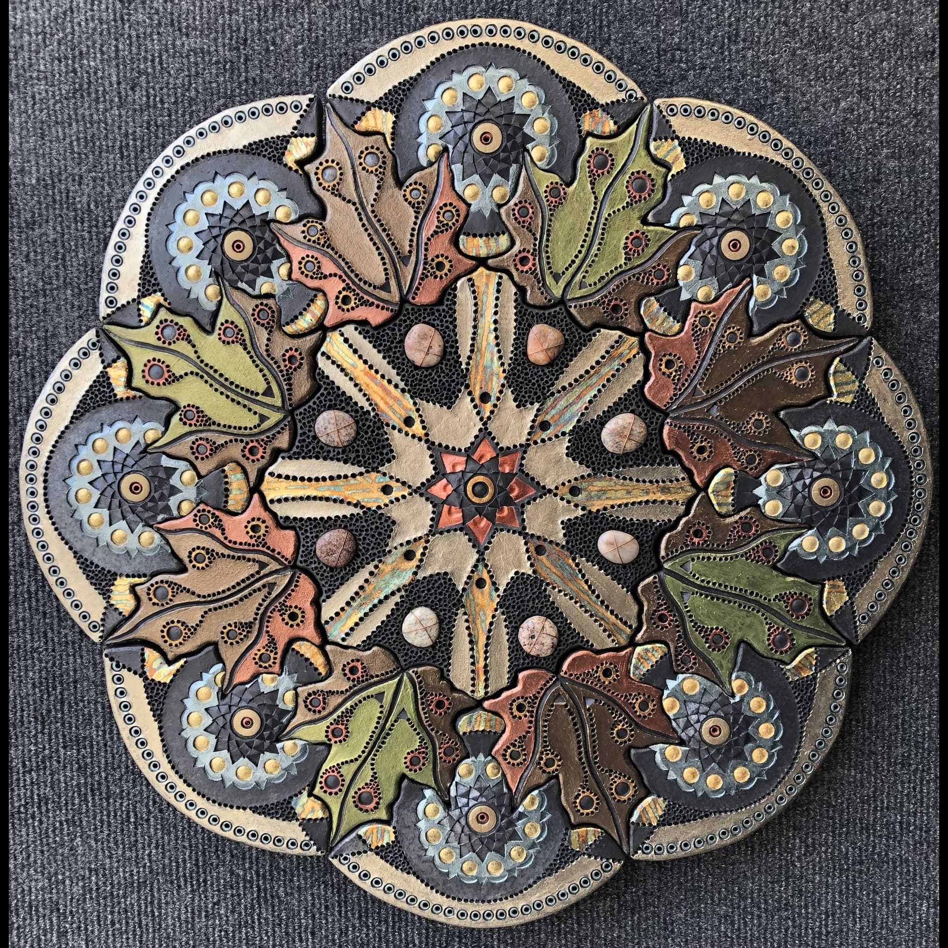 Clay circular geometric design.
