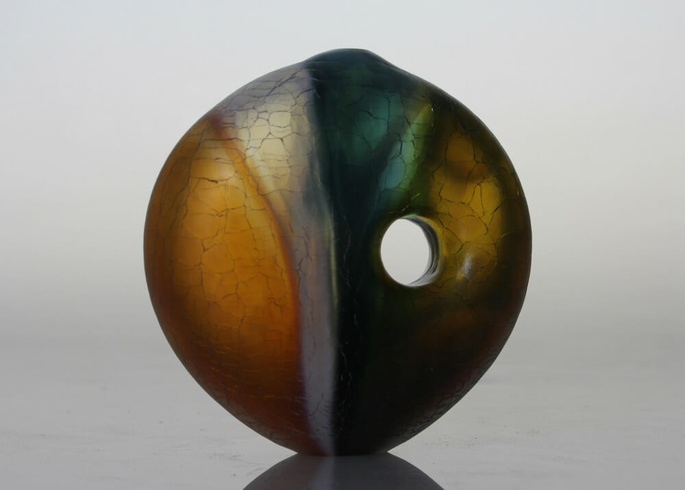 Circular glass vase.