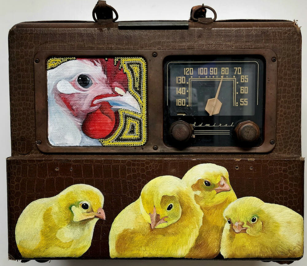 Suitcase radio with a chicken and four chicks painted on and added beading.