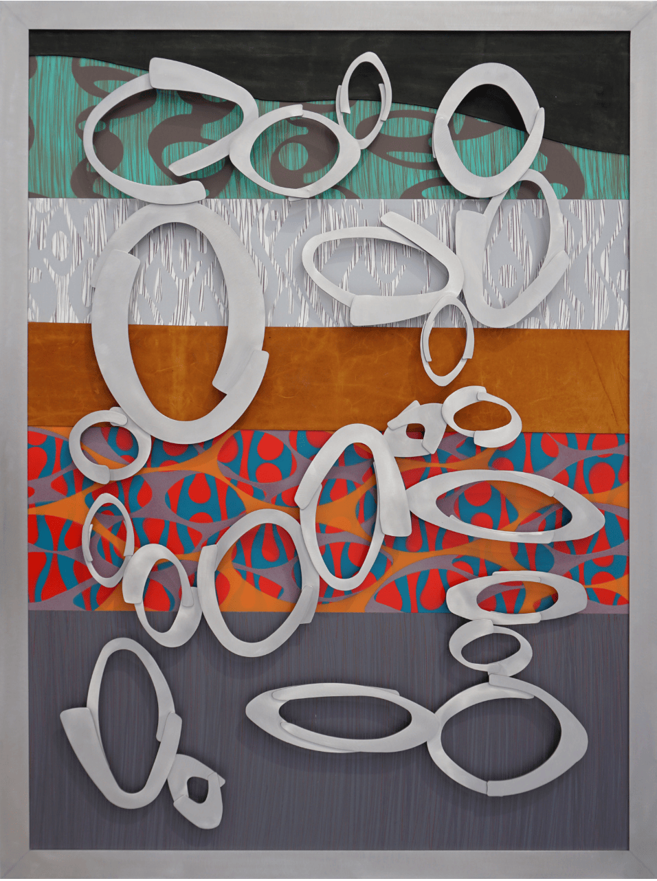 Metal artwork with cut aluminum shapes welded into dimensional forms.