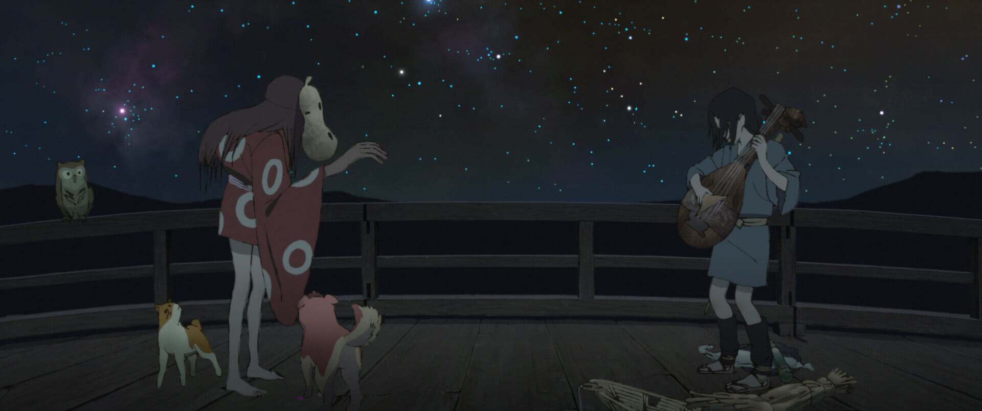 Film still from the animated film Inu-Oh depicting two people, two dogs, and an owl standing outdoors at night.