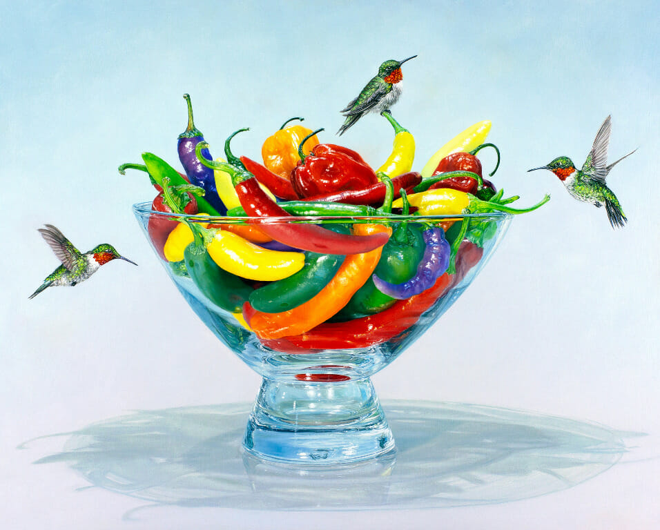 Still life painting of peppers in a transparent glass bowl with three hummingbirds flying around it.