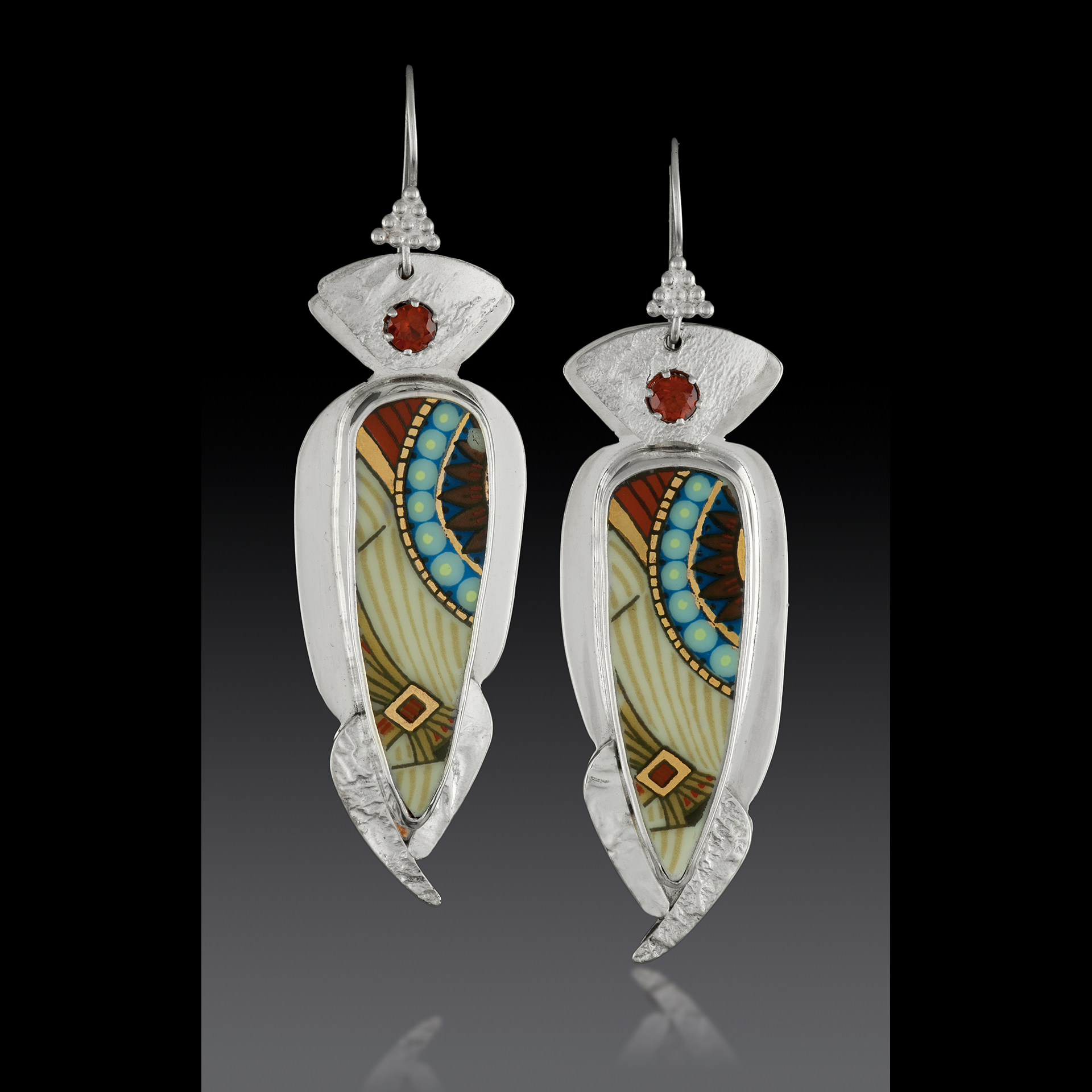 Dangly earrings with many colors.