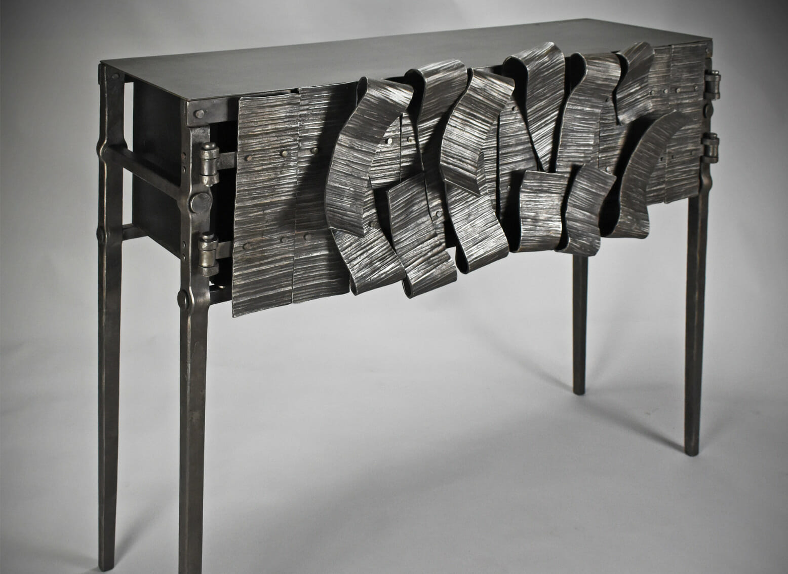 Hand forged metal cabinet.