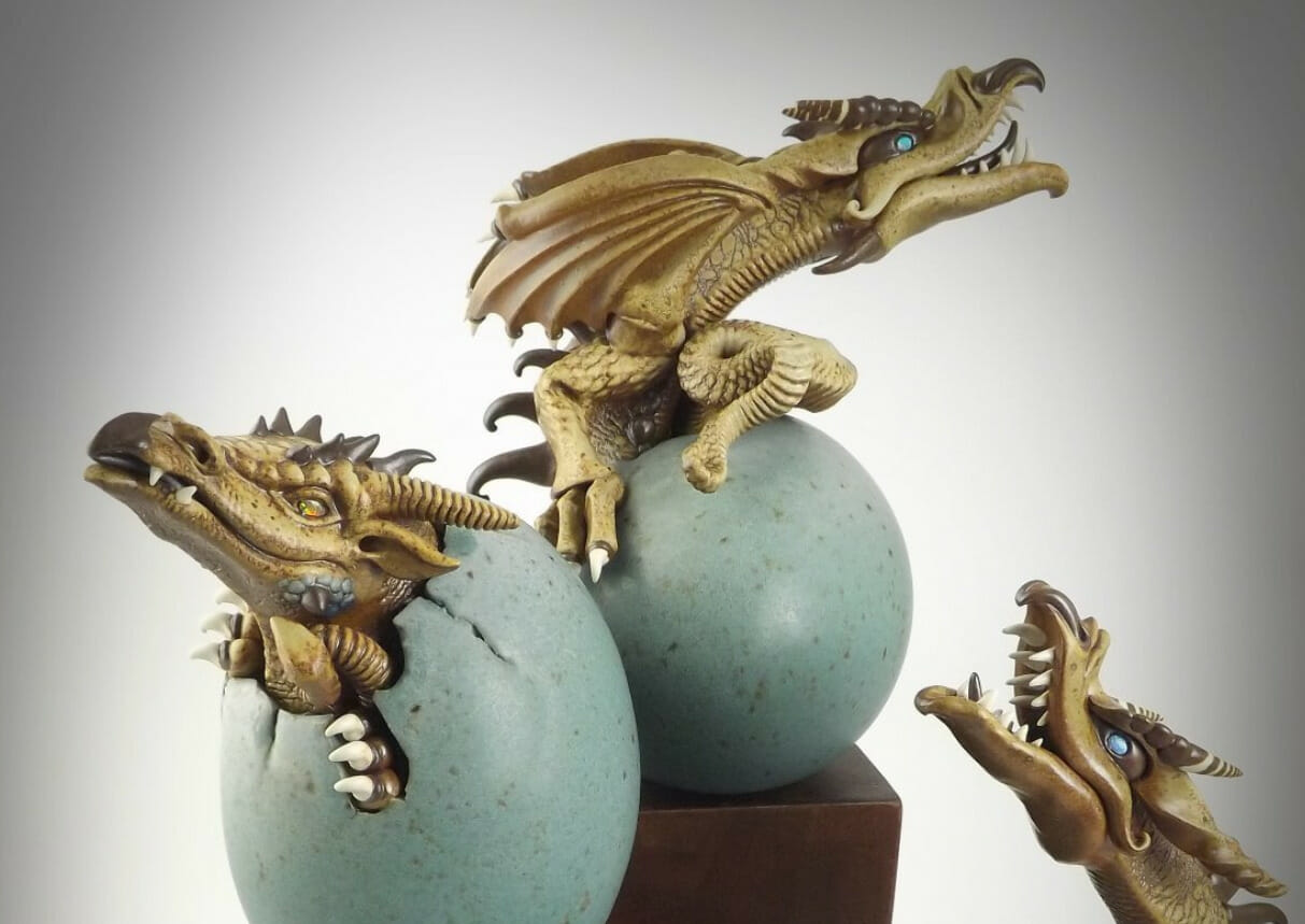 Sculptures of dragons hatching out of eggs.