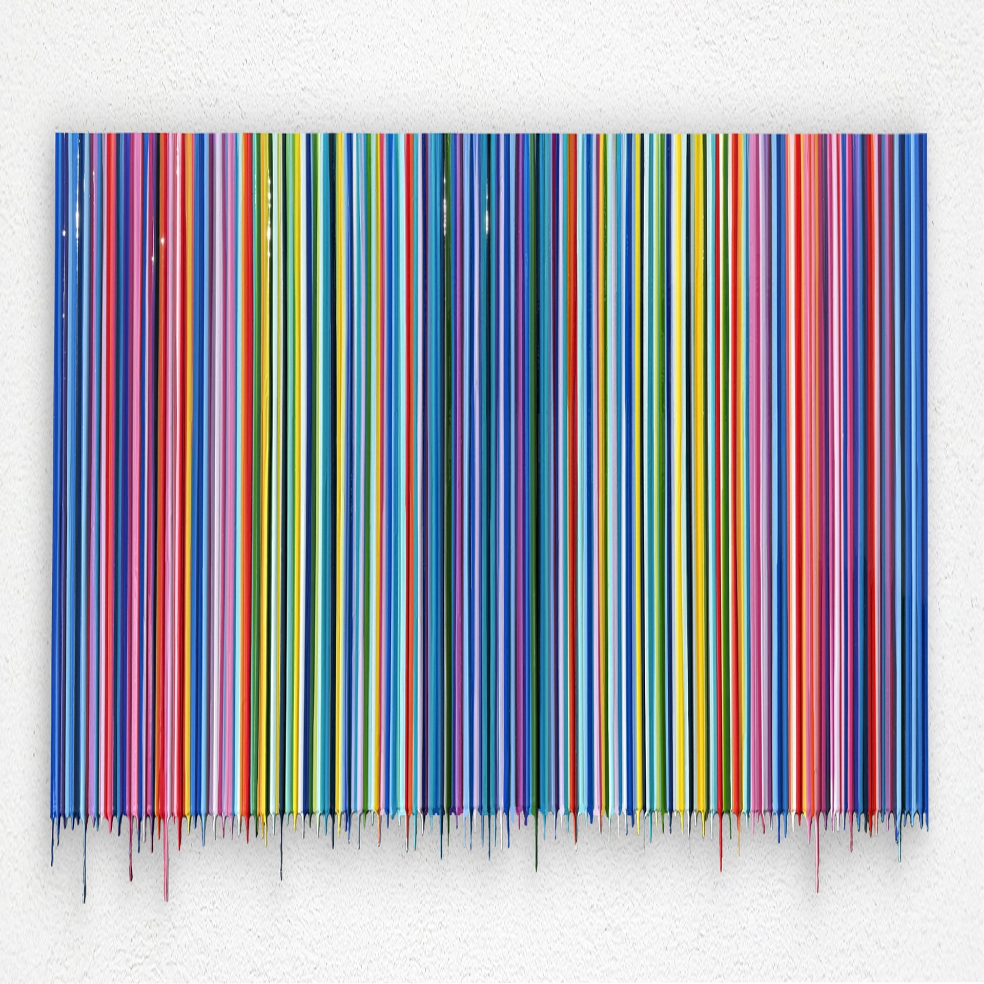 Many colorful stripes on a canvas.