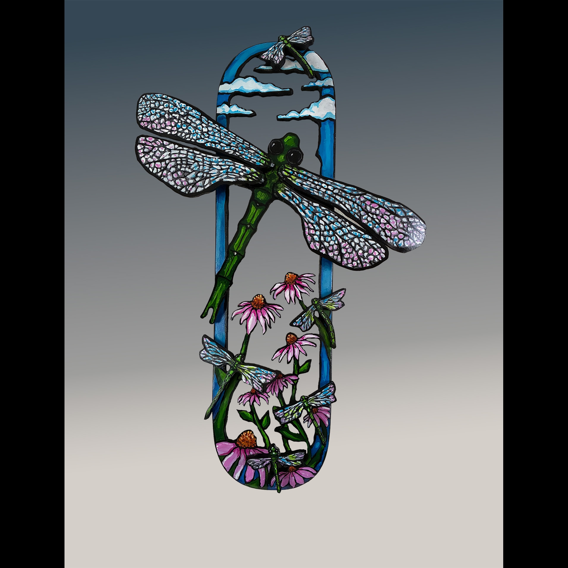 A glass artwork of a dragonfly.