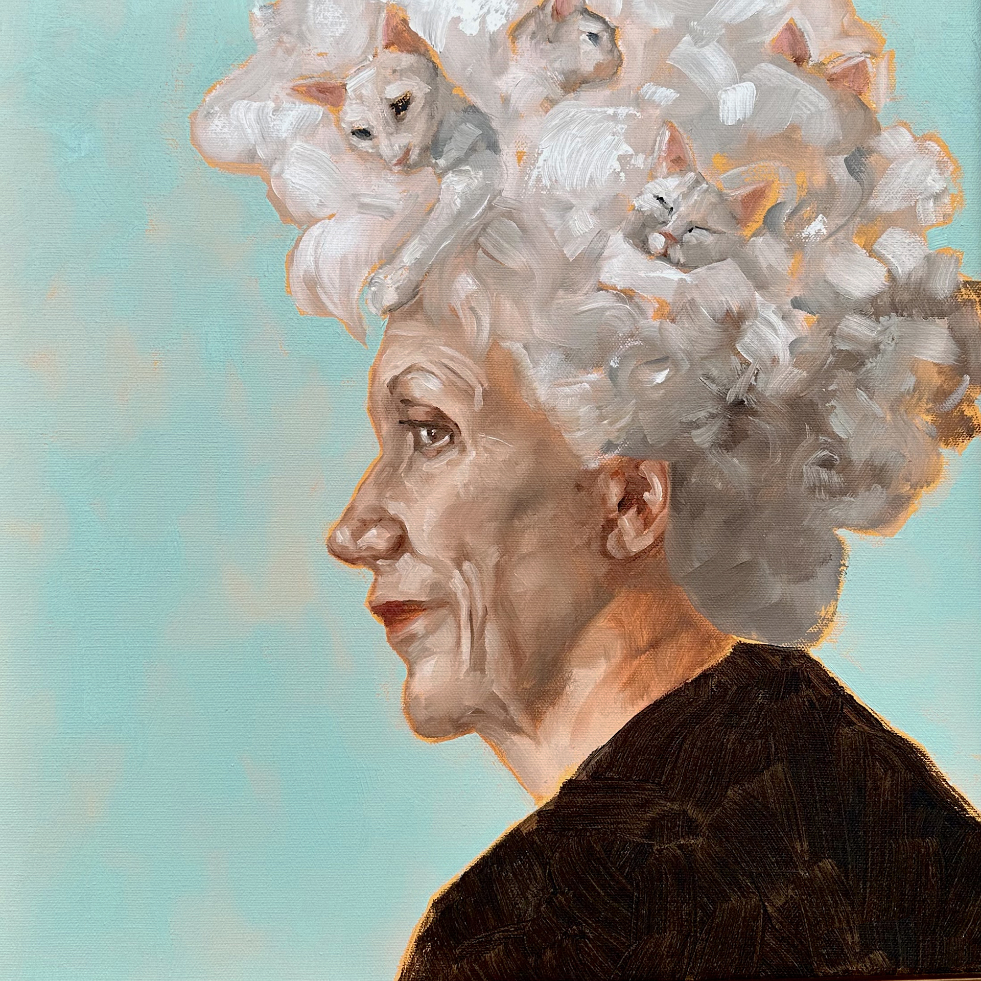 An older woman with cats in her hair.