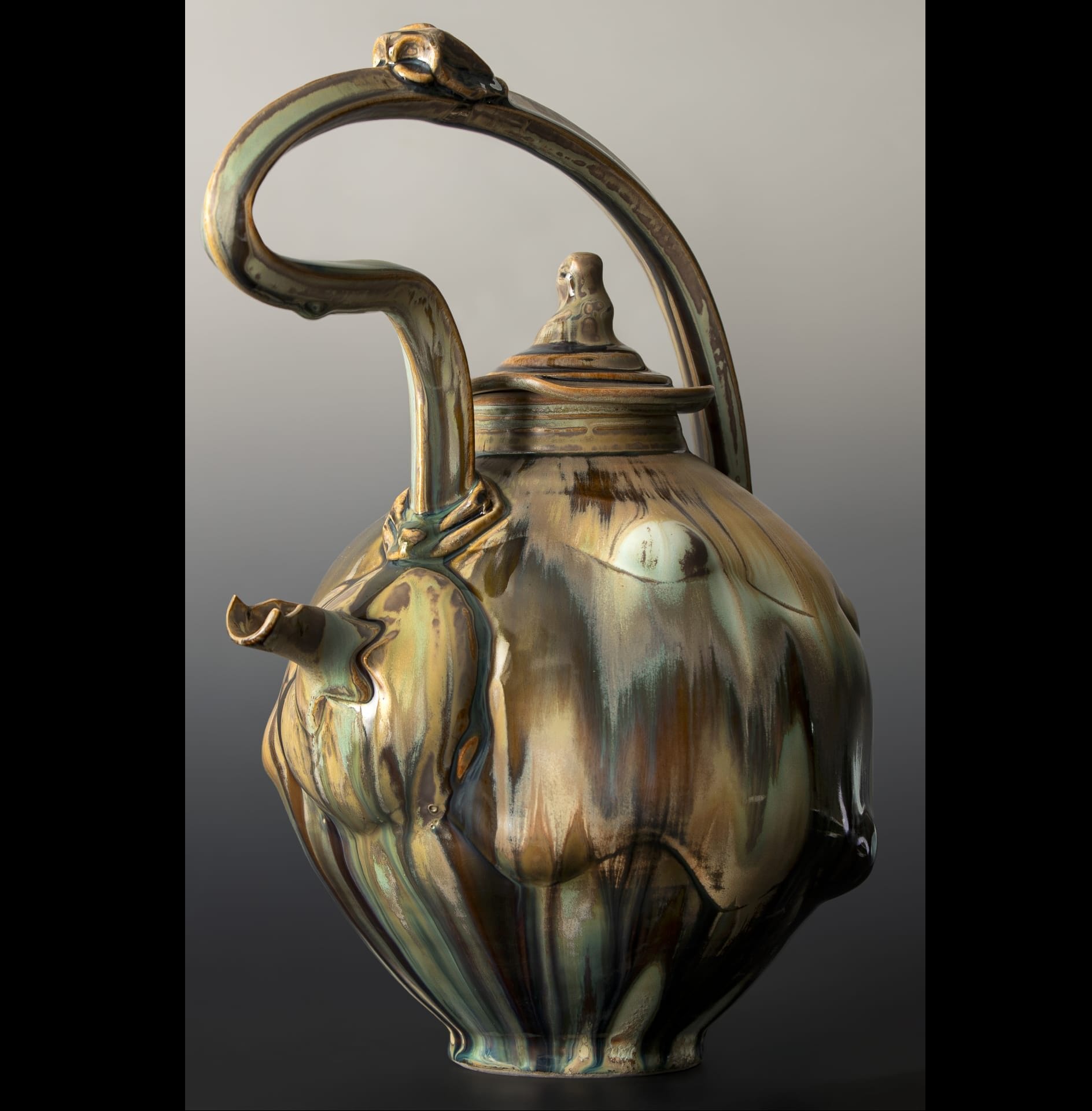 A ceramic and abstracted tea pot.