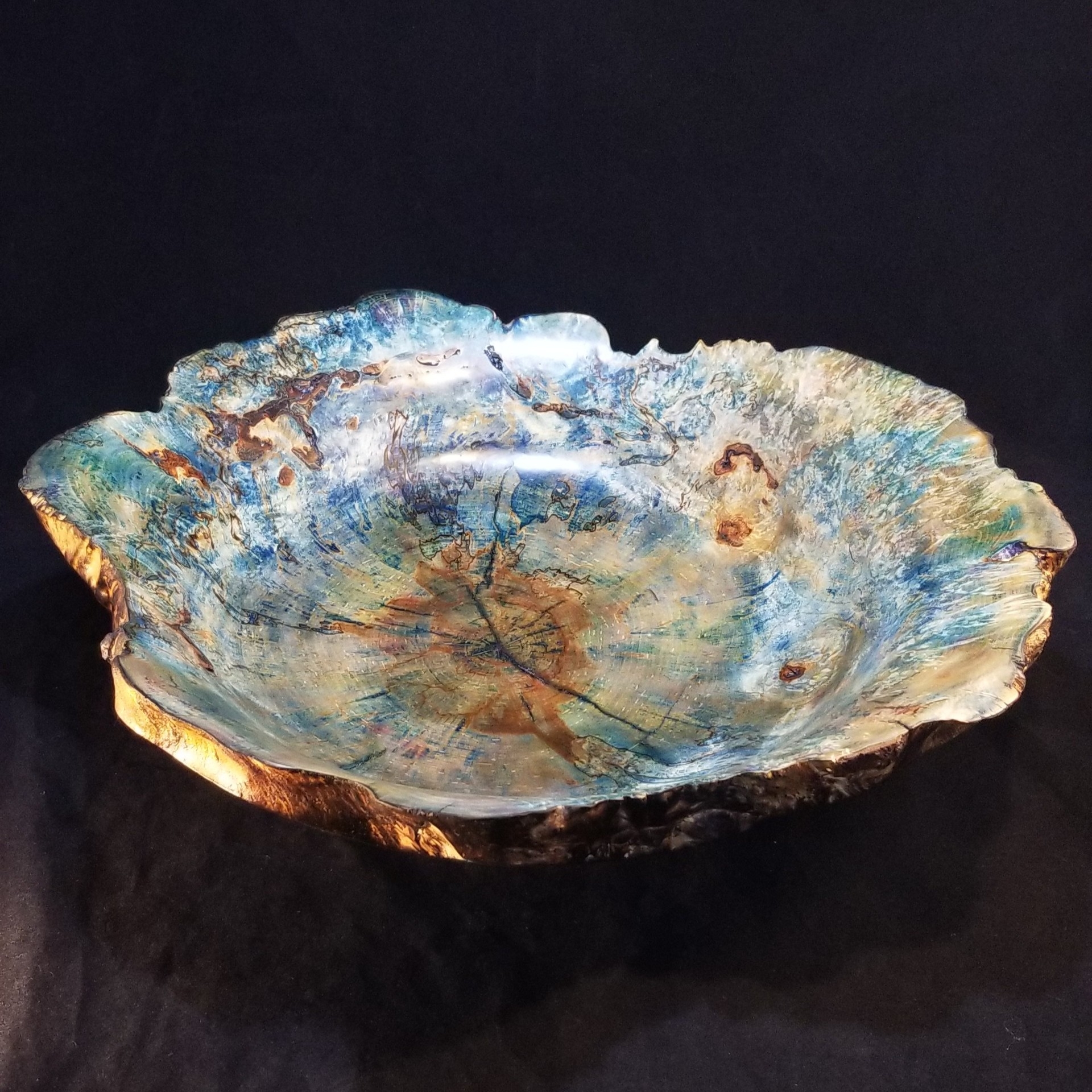 A blue wooden bowl.