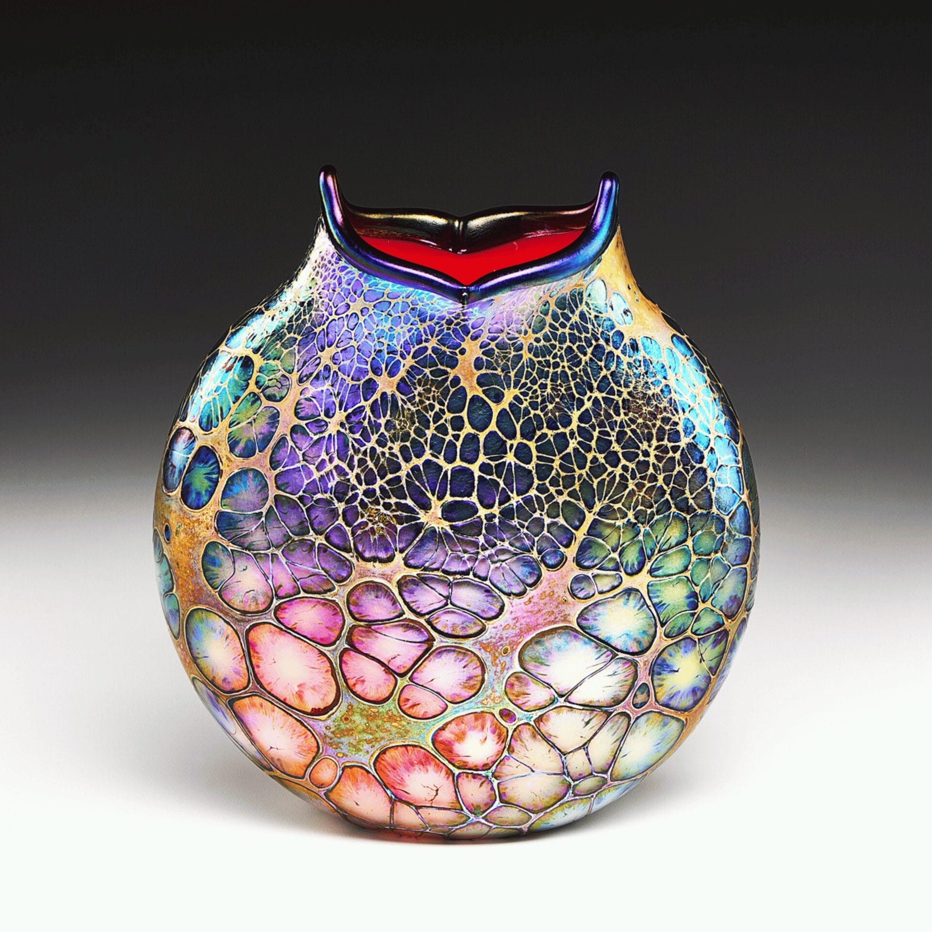 A colorful glass container with speckles.