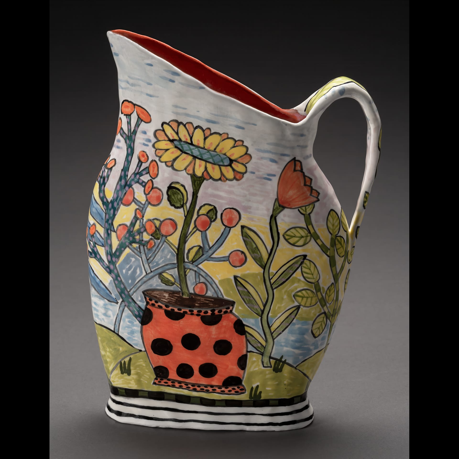 A vase with flowers on it.