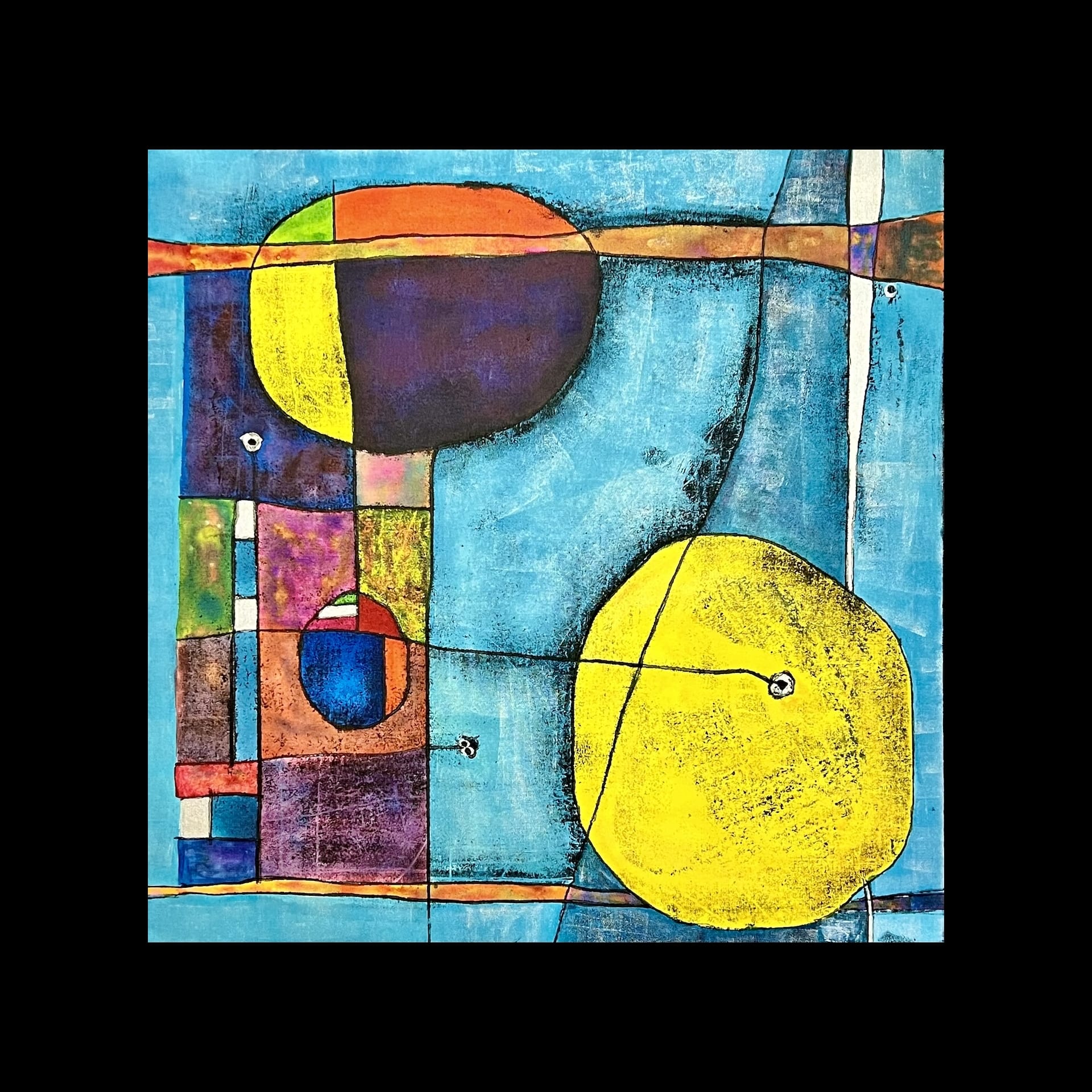 Abstract shapes in blue, yellow and red.
