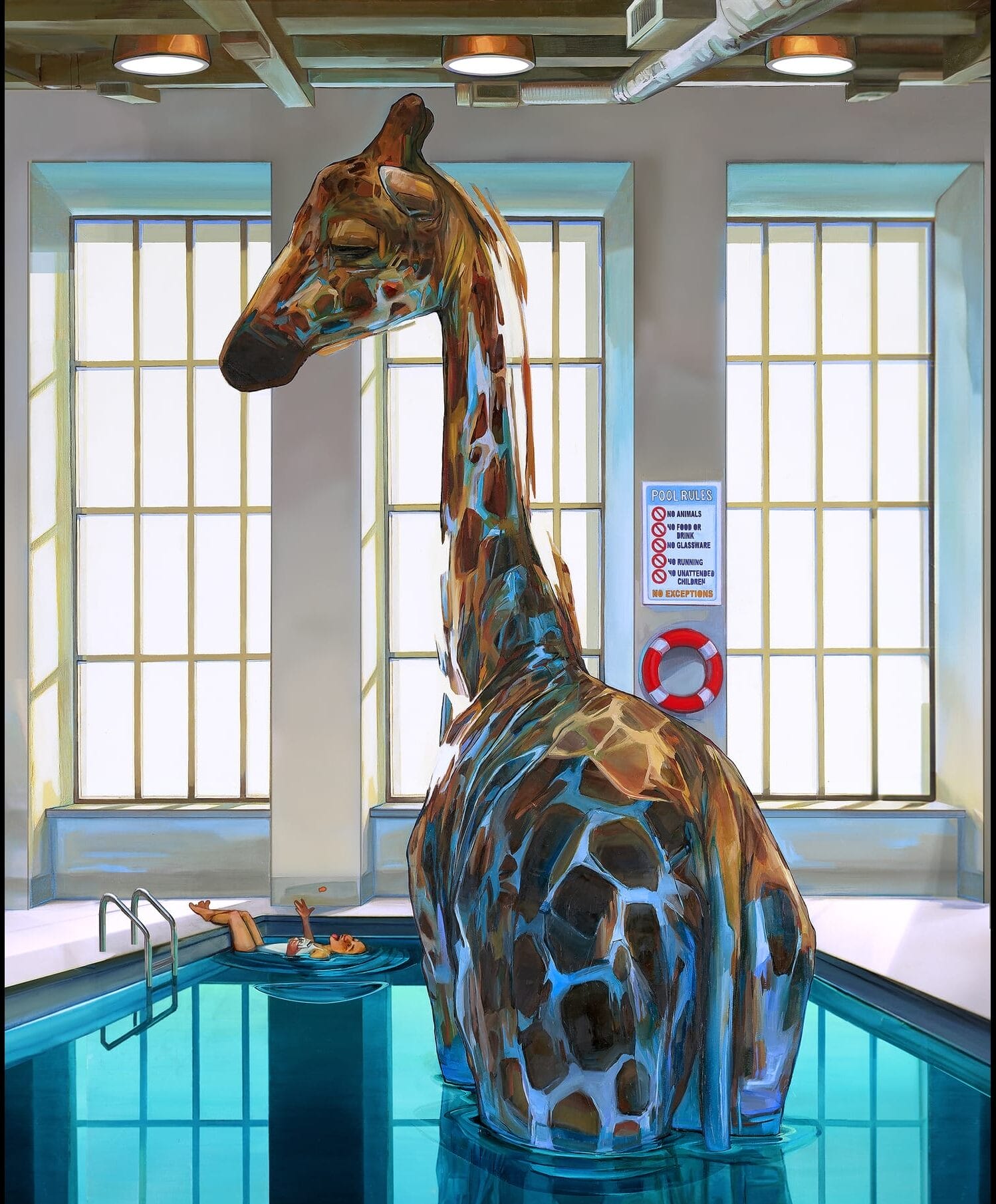 A giraffe in a swimming pool