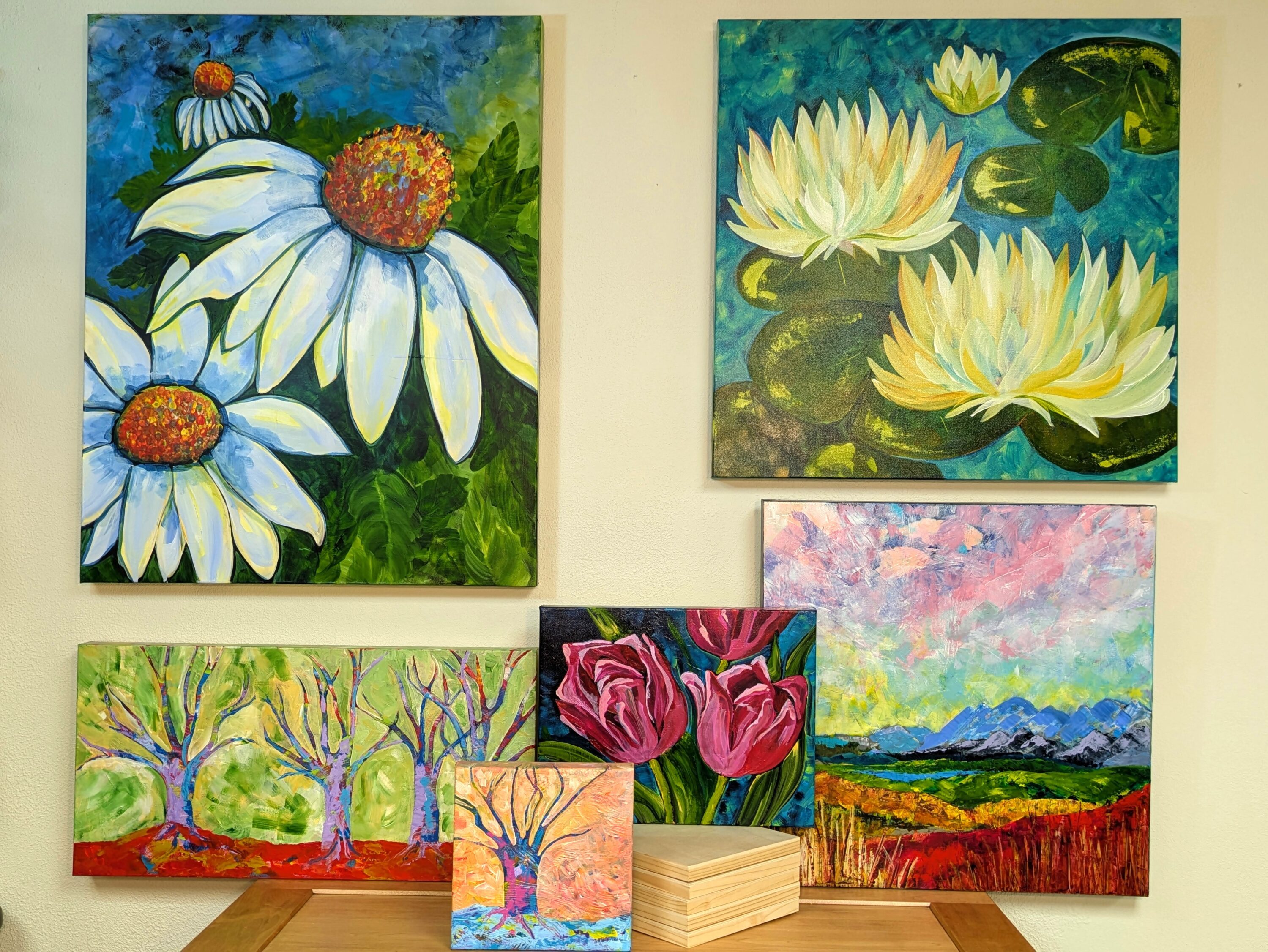 a collection of floral paintings.