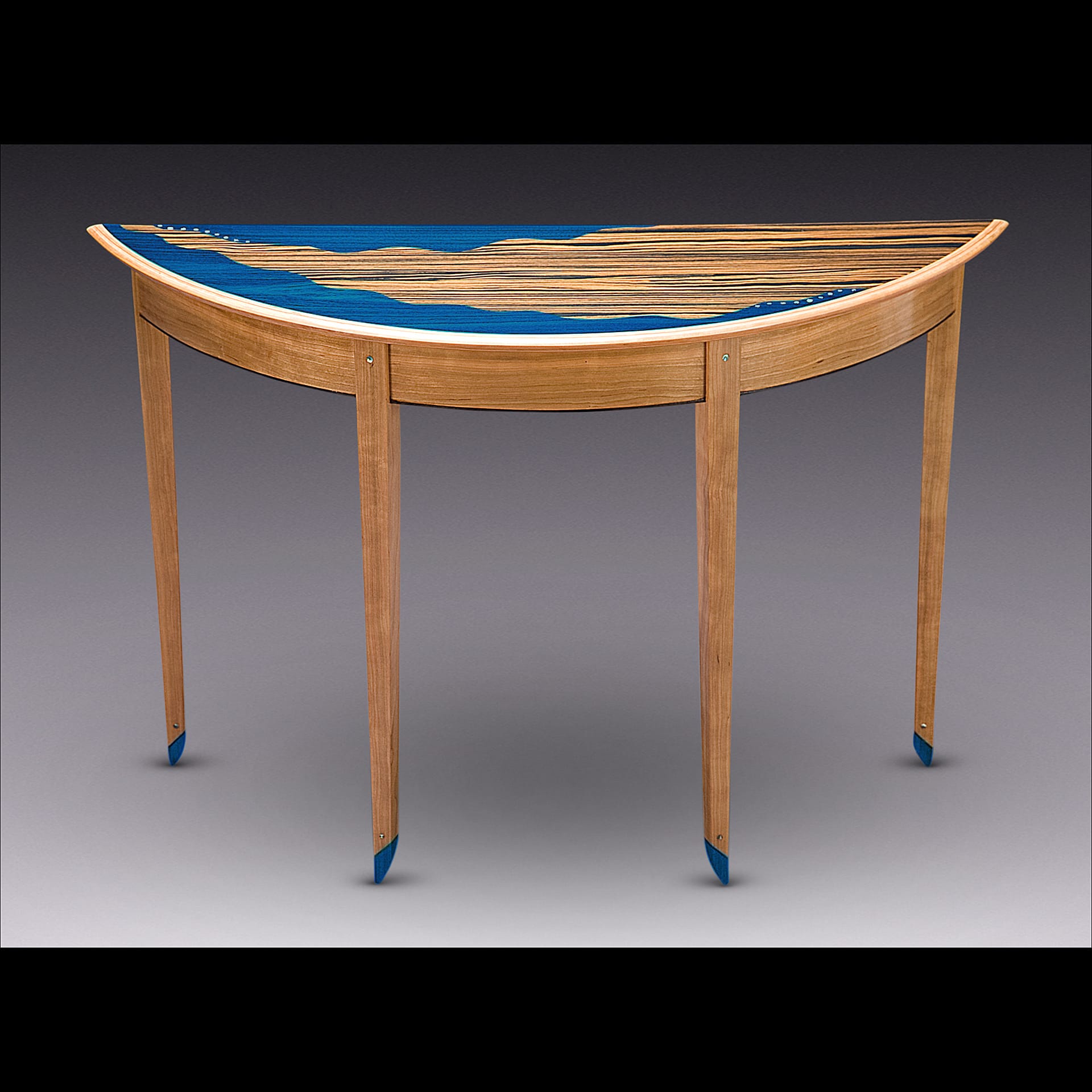 A semicircle table with blue accents.