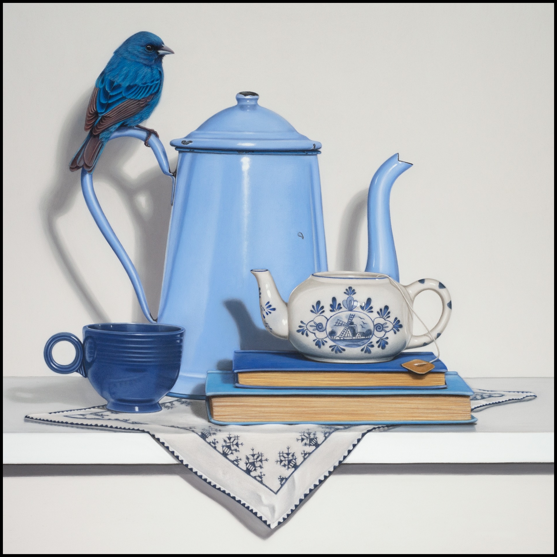 A blue bird by blue objects on a shelf.
