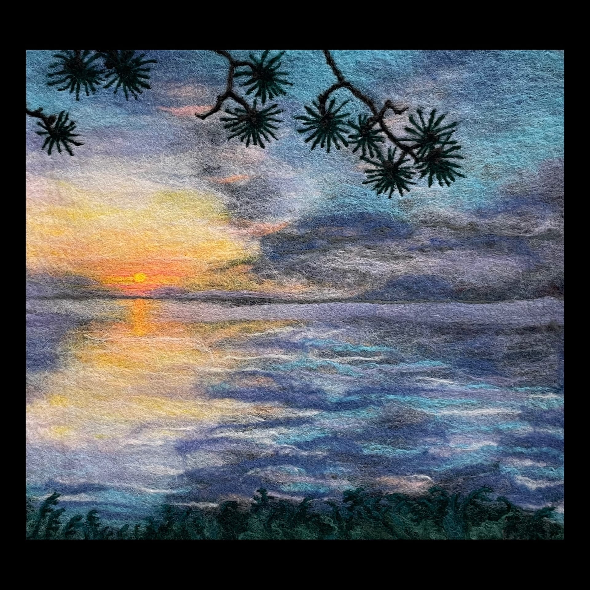 A felt embroidered sunset.