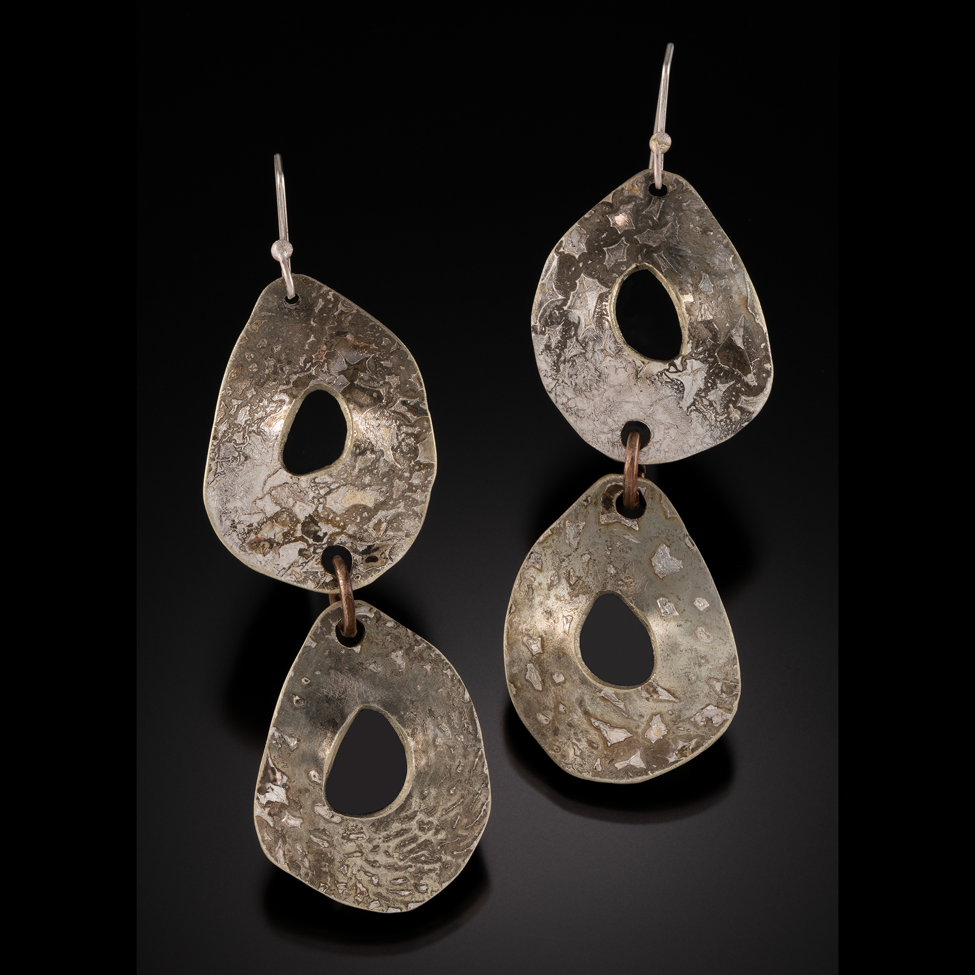 Long earrings made up of two circles.