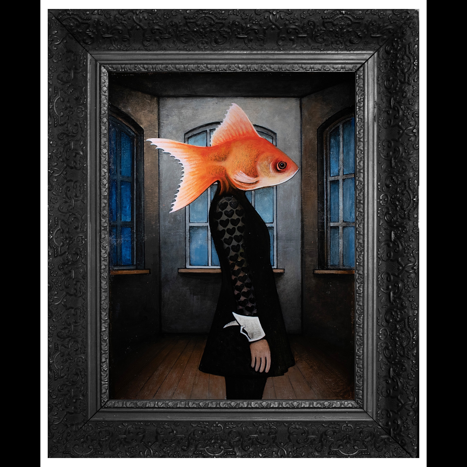 Someone in a suit with a gold fish for a head.