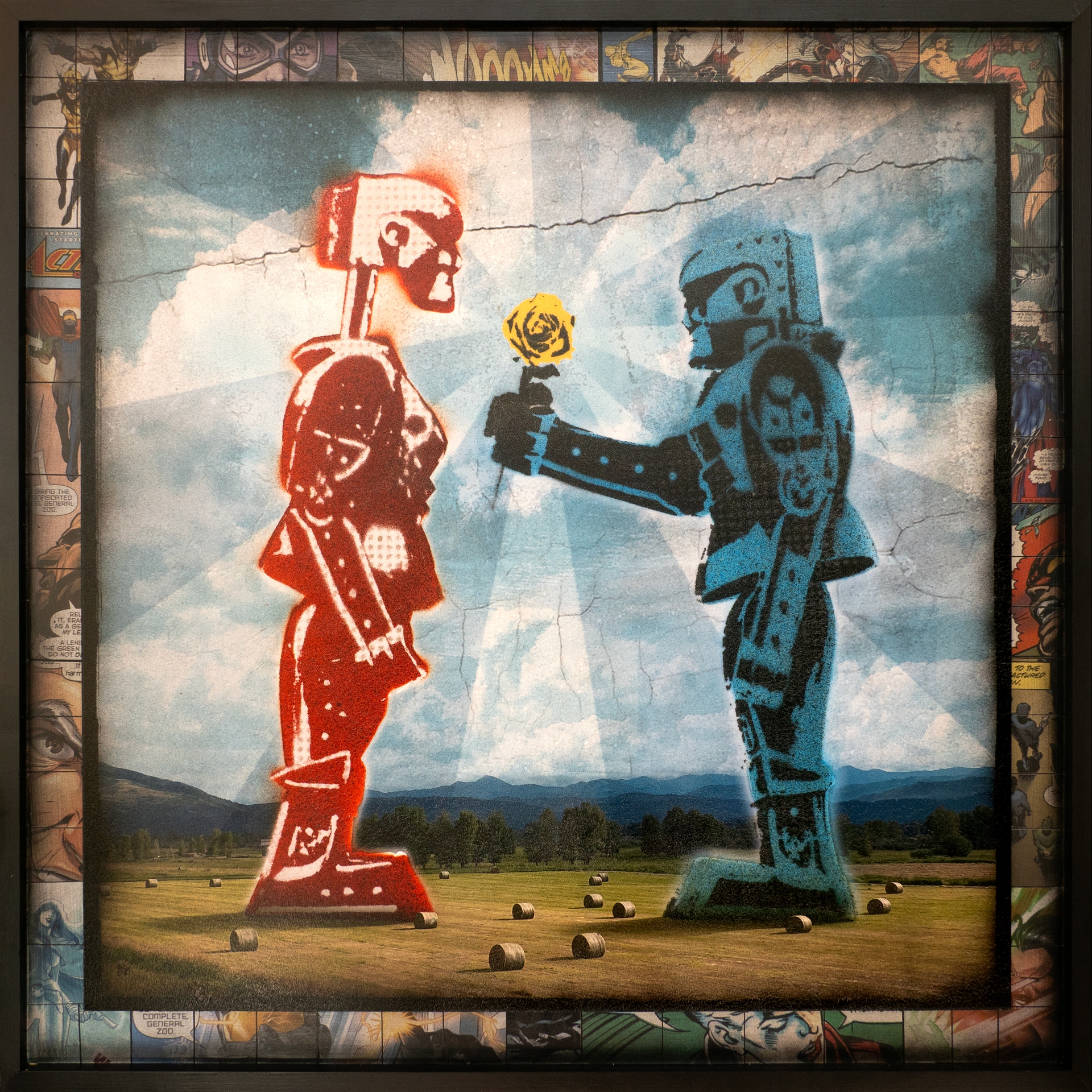 Rock em sock em robots in a field with a frame.