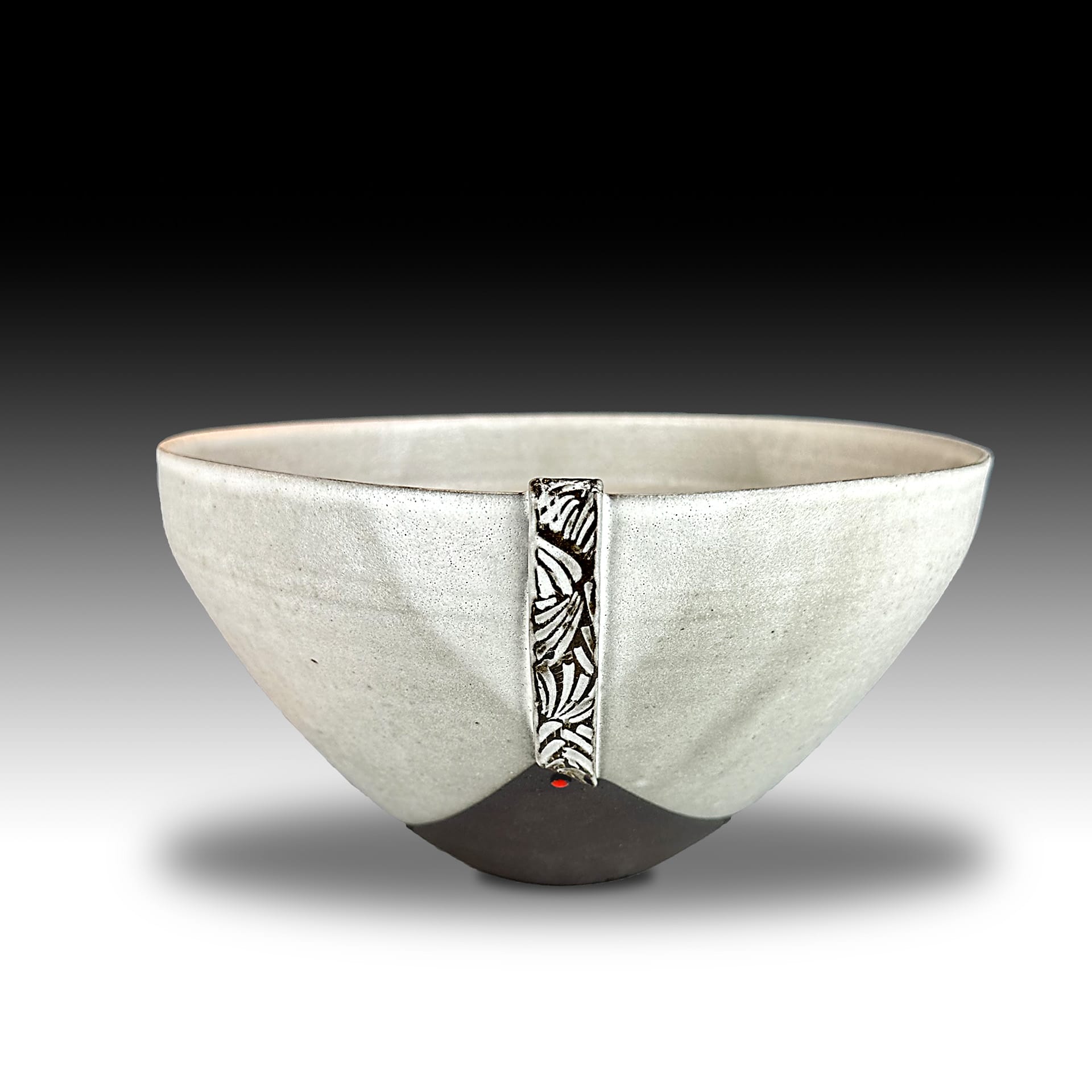 A ceramic black and white bowl.