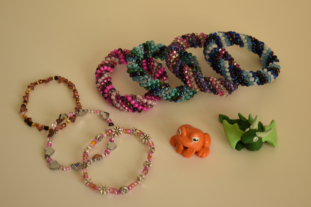 Bracelets and small figurines. 