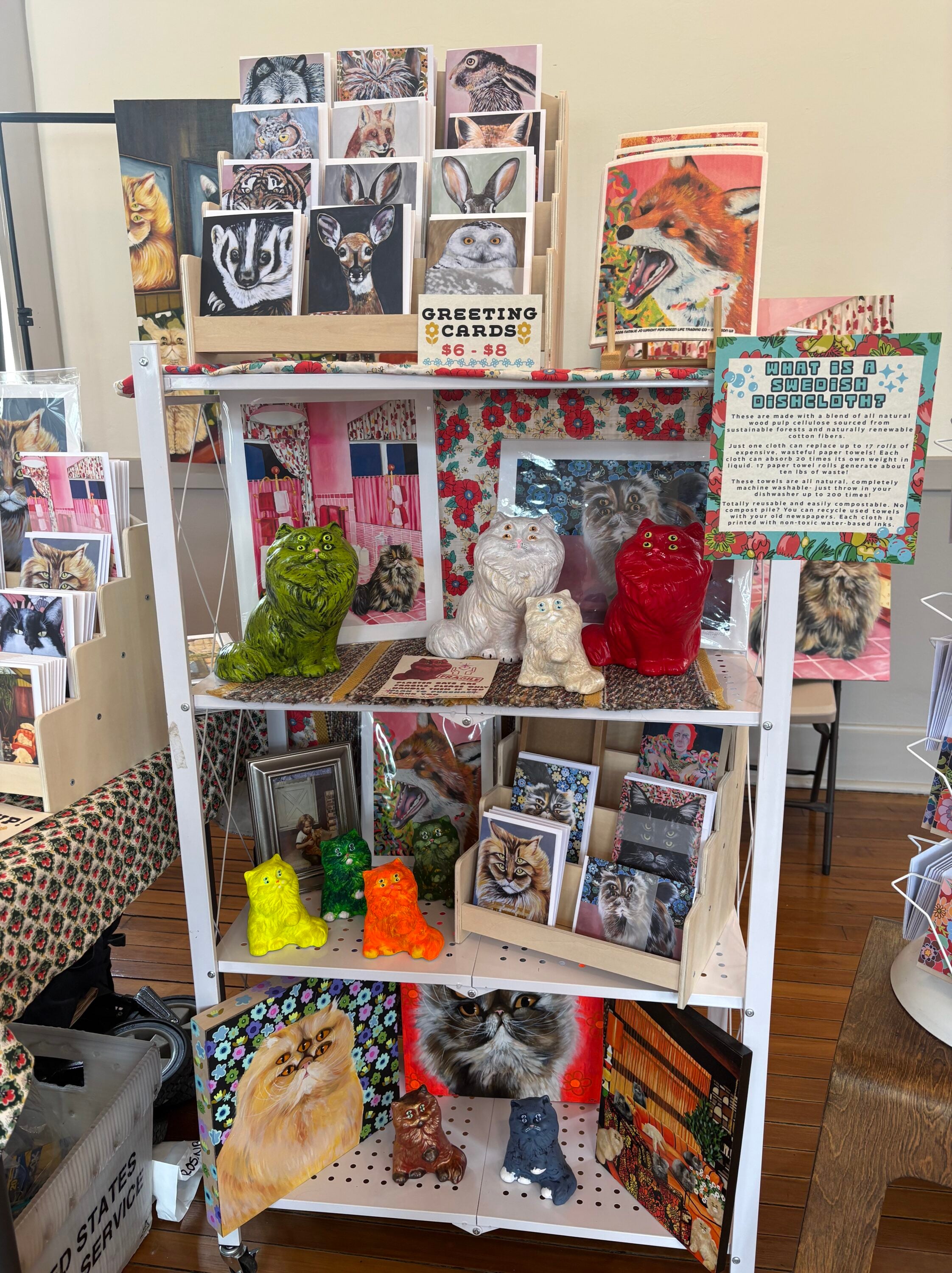 A booth set up at an art fair.