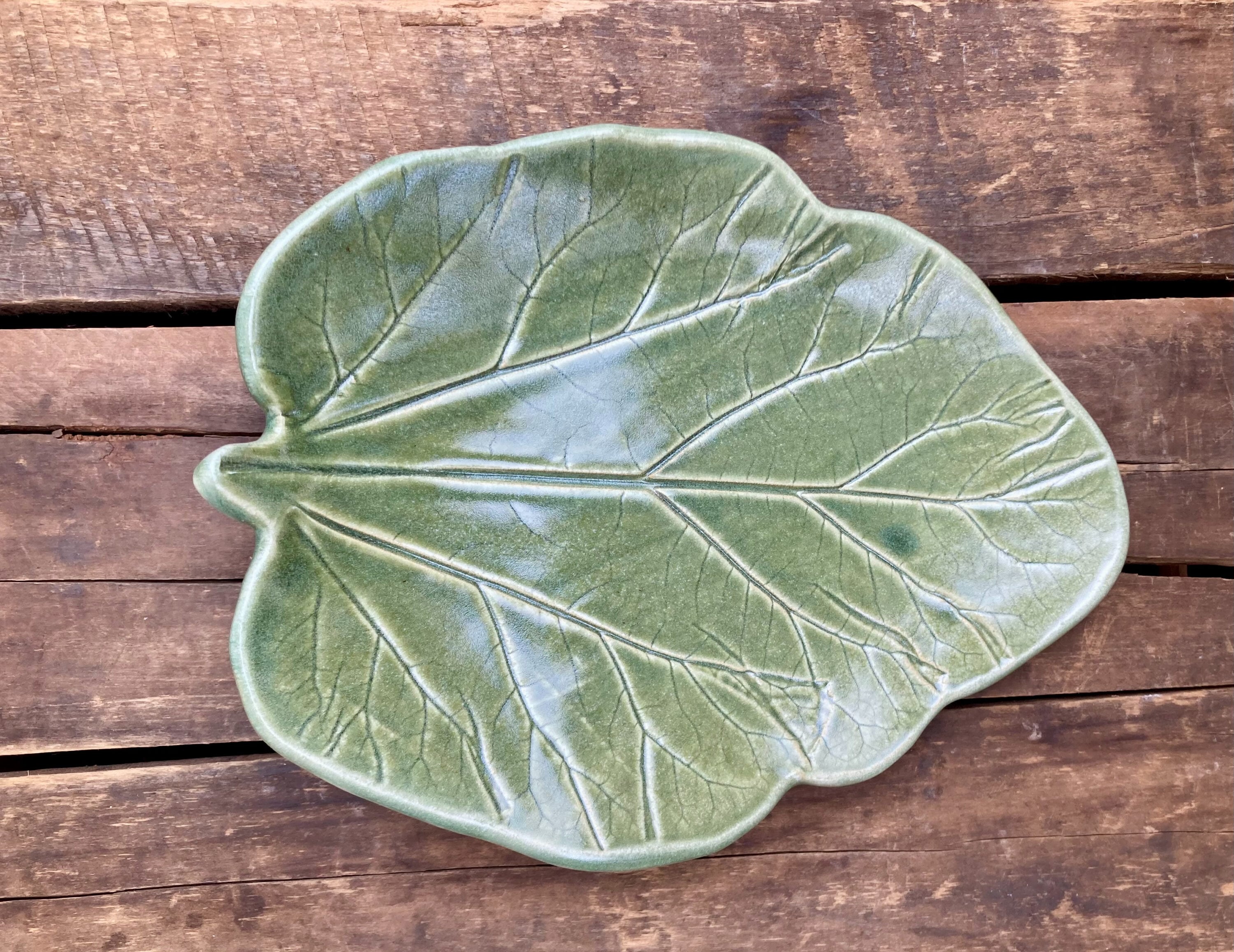 A ceramic leaf.